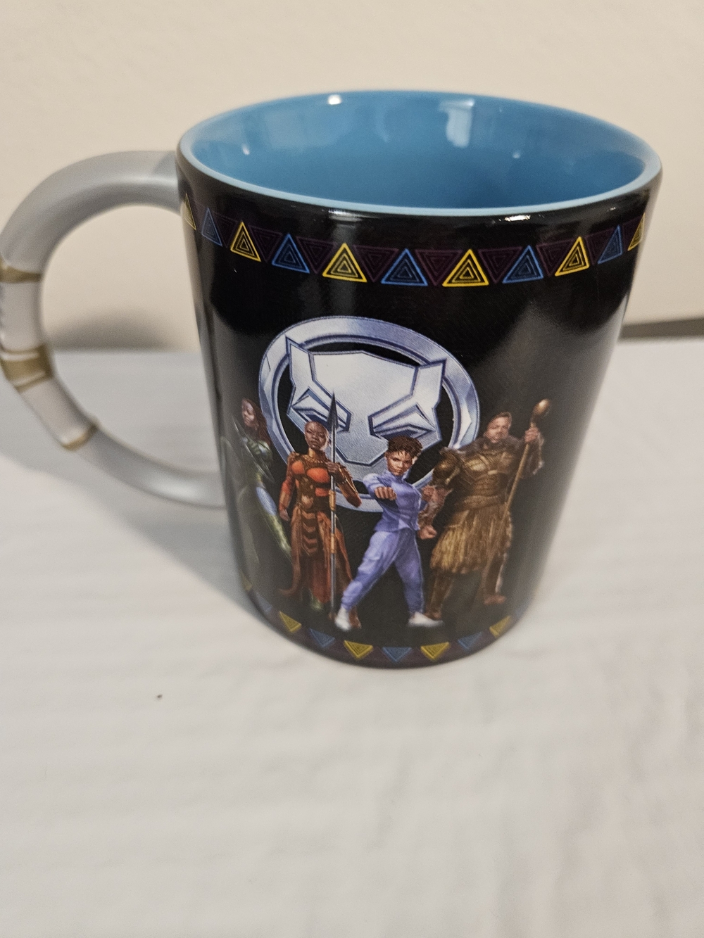 Disney Store Black Panther: Wakanda Forever ceramic mug featuring character art